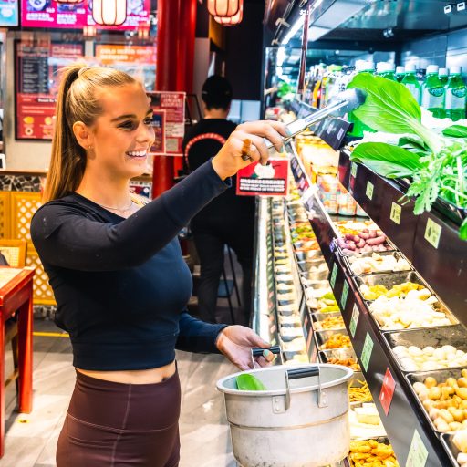 Person picking their food options at swanston street branch